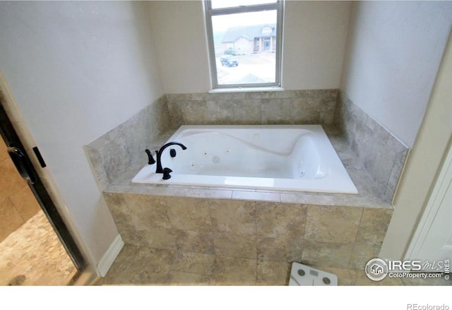 3106 Megan Way, Berthoud, CO 80513 - full bath with a tub with jets