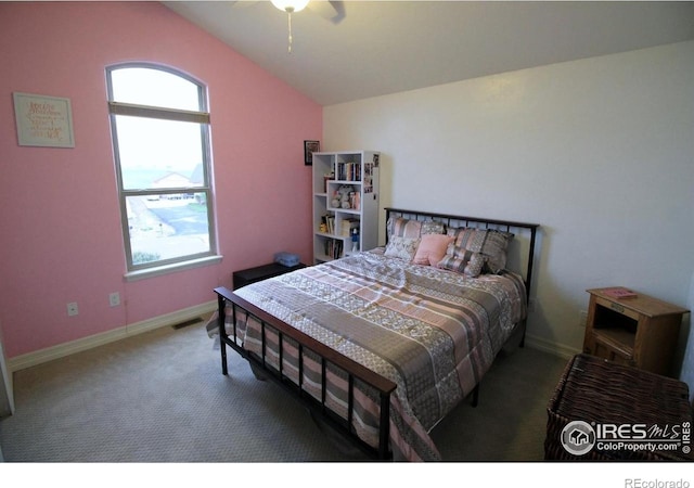 3106 Megan Way, Berthoud, CO 80513 - carpeted bedroom with vaulted ceiling, baseboards, and ceiling fan