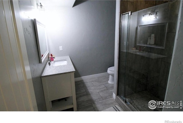 3106 Megan Way, Berthoud, CO 80513 - full bath with vanity, toilet, and a stall shower