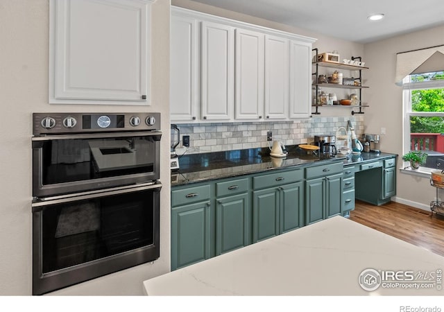 23570 E Holly Hills Way, Parker, CO 80138 - kitchen with white cabinetry, tasteful backsplash, light wood finished floors, open shelves, and recessed lighting