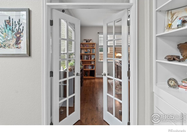 23570 E Holly Hills Way, Parker, CO 80138 - interior space featuring french doors and dark wood-style floors
