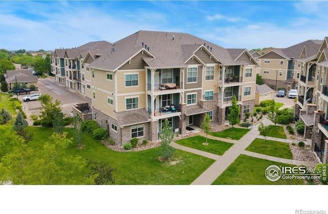 4672 Hahns Peak Dr Unit 101, Loveland, CO 80538 - view of property with a residential view