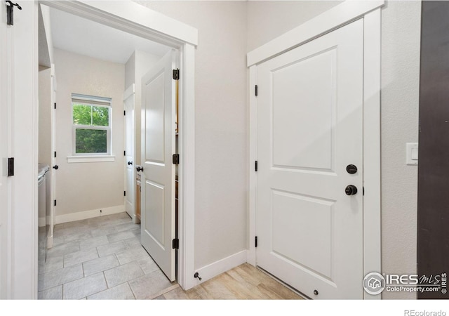 4672 Hahns Peak Dr Unit 101, Loveland, CO 80538 - doorway featuring baseboards