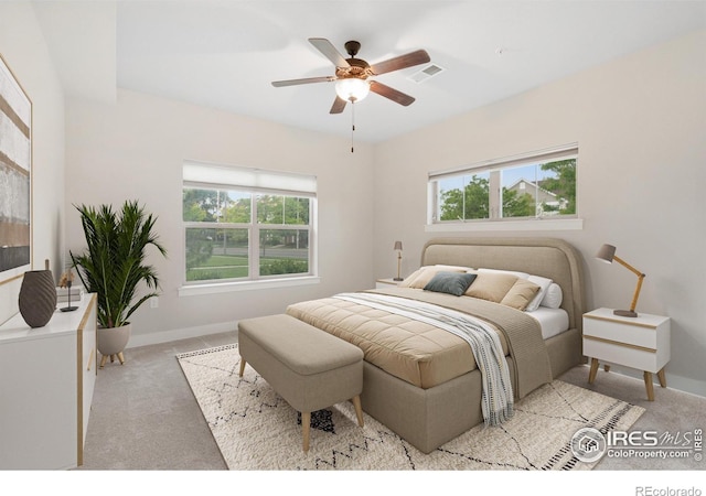 4672 Hahns Peak Dr Unit 101, Loveland, CO 80538 - bedroom featuring carpet floors, baseboards, and ceiling fan