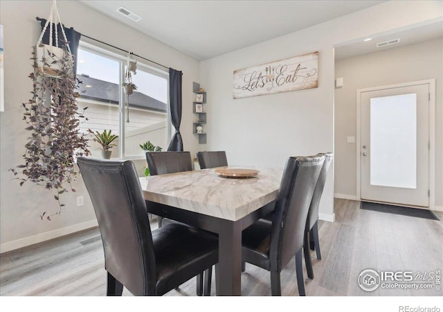 608 Apex Trl, Ault, CO 80610 - dining room with light wood-type flooring and baseboards