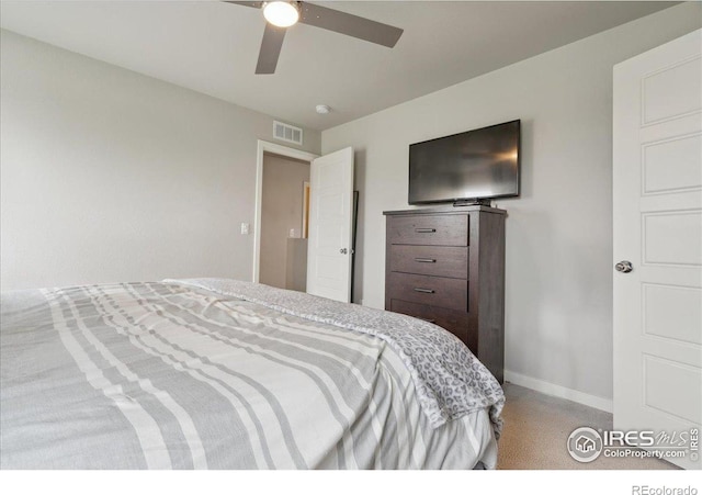 608 Apex Trl, Ault, CO 80610 - bedroom featuring baseboards, light carpet, and a ceiling fan