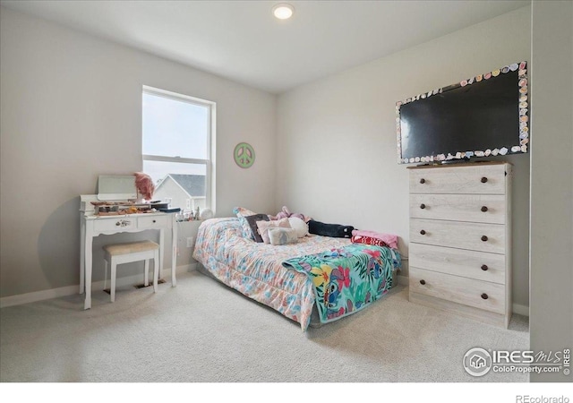 608 Apex Trl, Ault, CO 80610 - carpeted bedroom featuring baseboards