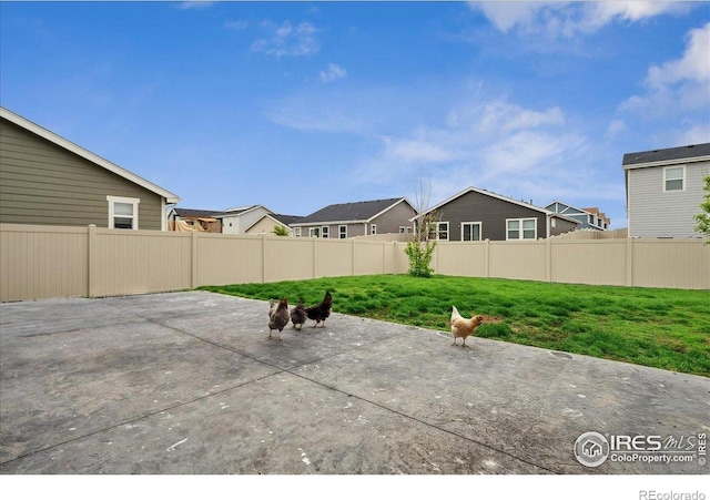 608 Apex Trl, Ault, CO 80610 - view of patio / terrace featuring a residential view