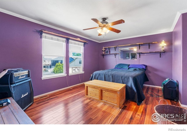 1086 Mockingbird St, Brighton, CO 80601 - bedroom with wood finished floors, ornamental molding, baseboards, and a ceiling fan