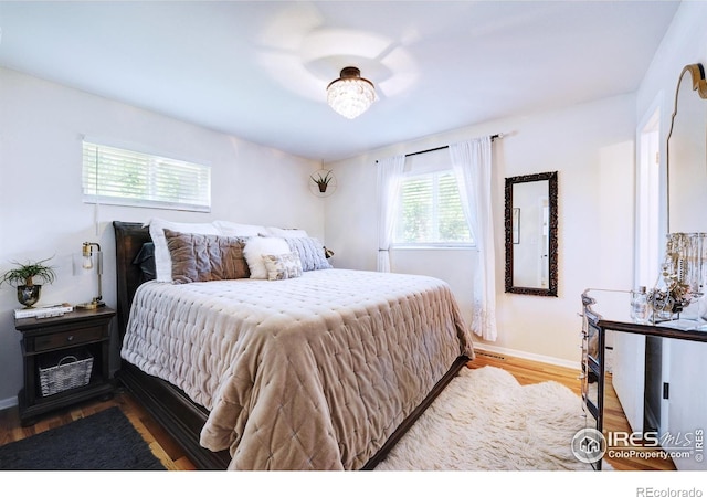 855 33rd St, Boulder, CO 80303 - bedroom featuring wood finished floors and baseboards