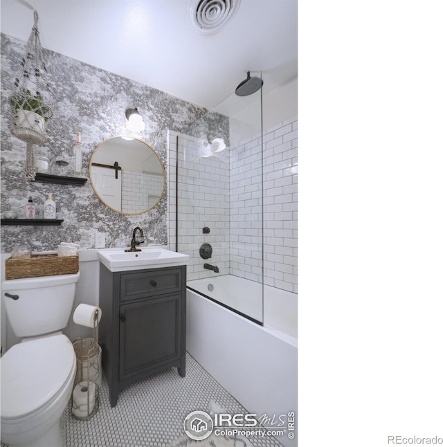 855 33rd St, Boulder, CO 80303 - bathroom with toilet, vanity, shower / bath combination, and tile patterned floors