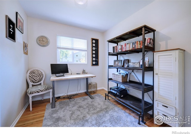 855 33rd St, Boulder, CO 80303 - home office featuring wood finished floors and baseboards