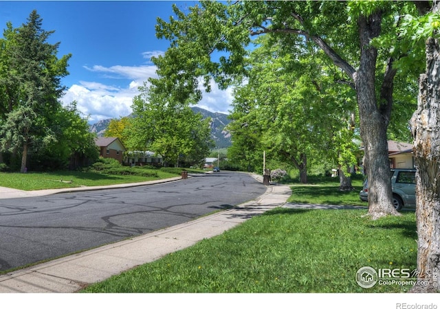 855 33rd St, Boulder, CO 80303 - view of asphalt road featuring curbs and a mountain view