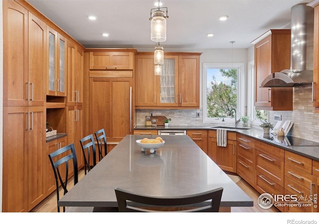4094 Bimini Ct, Boulder, CO 80301 - kitchen with electric stovetop, wall chimney exhaust hood, a sink, tasteful backsplash, and decorative light fixtures