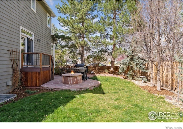 4094 Bimini Ct, Boulder, CO 80301 - view of yard featuring a fire pit and a patio area