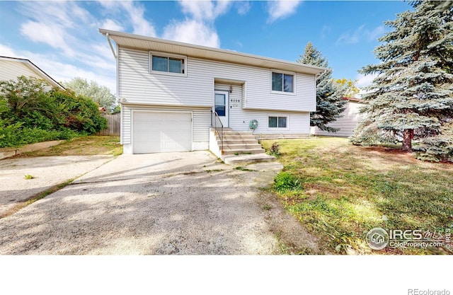8208 Peakview Dr, Fort Collins, CO 80528 - raised ranch featuring a garage and driveway