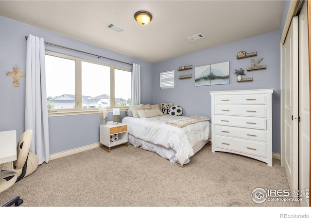 873 Signal Ct, Timnath, CO 80547 - bedroom featuring light carpet, a closet, and baseboards