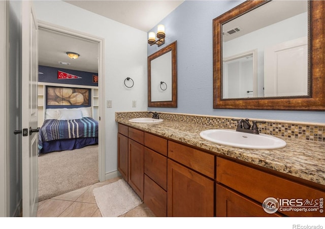 873 Signal Ct, Timnath, CO 80547 - bathroom with double vanity, ensuite bath, and tile patterned floors