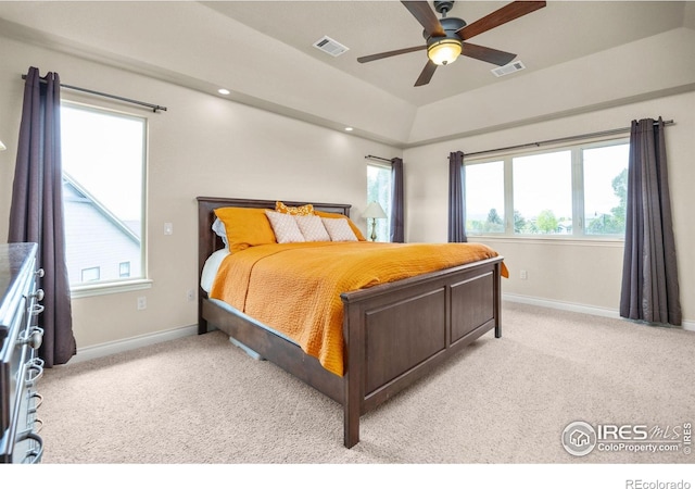 873 Signal Ct, Timnath, CO 80547 - bedroom with light colored carpet, multiple windows, baseboards, and a ceiling fan