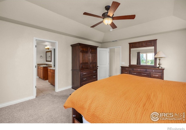 873 Signal Ct, Timnath, CO 80547 - bedroom with light carpet, baseboards, vaulted ceiling, connected bathroom, and a ceiling fan