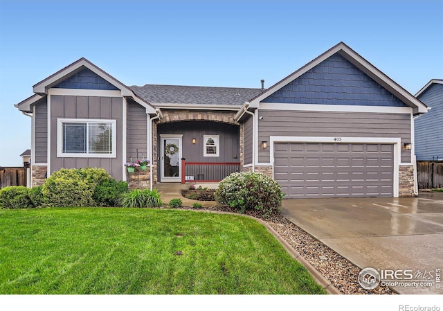 405 Timber Ridge Parkway, Severance, CO 80550 - single story home with stone siding, board and batten siding, a front lawn, and an attached garage