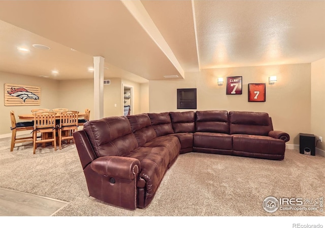 405 Timber Ridge Parkway, Severance, CO 80550 - carpeted living room featuring baseboards