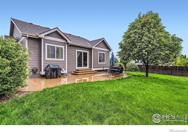 405 Timber Ridge Parkway, Severance, CO 80550 - back of house with entry steps and a patio area