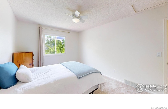 2415 Sunray Ct, Fort Collins, CO 80525 - bedroom with carpet flooring, a textured ceiling, ceiling fan, and baseboards