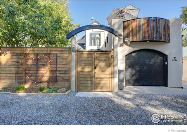 2434 Mapleton Ave, Boulder, CO 80304 - view of outdoor structure with a garage and a gate