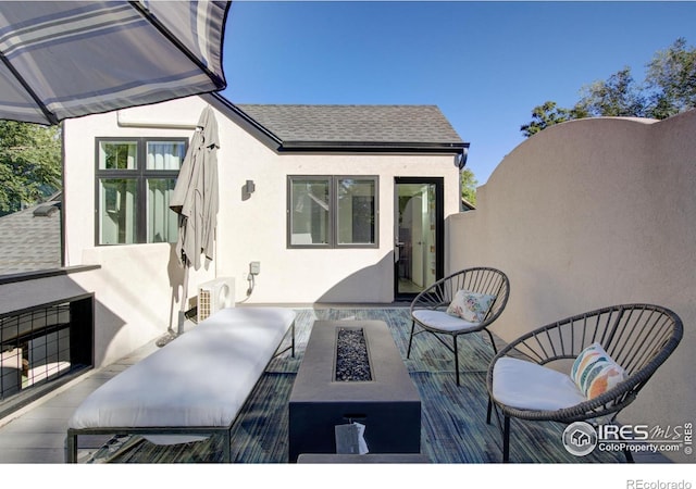 2434 Mapleton Ave, Boulder, CO 80304 - view of patio / terrace featuring an outdoor living space with a fire pit
