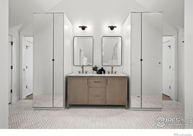 2434 Mapleton Ave, Boulder, CO 80304 - full bath featuring double vanity, walk in shower, and lofted ceiling