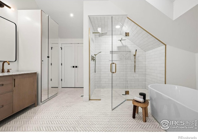 2434 Mapleton Ave, Boulder, CO 80304 - bathroom with a shower stall, a freestanding tub, vanity, and recessed lighting