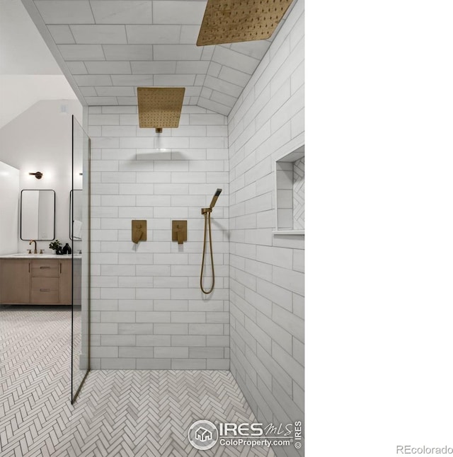 2434 Mapleton Ave, Boulder, CO 80304 - bathroom featuring vanity and tiled shower
