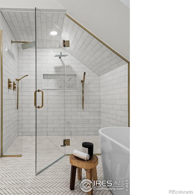 2434 Mapleton Ave, Boulder, CO 80304 - bathroom featuring a soaking tub and a stall shower