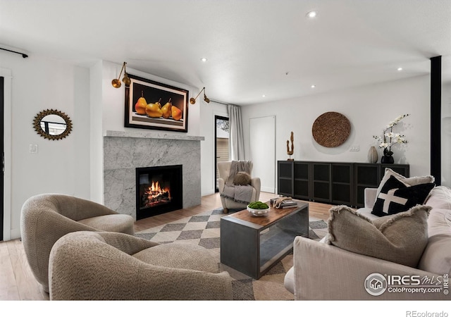 2434 Mapleton Ave, Boulder, CO 80304 - living area with a premium fireplace, wood finished floors, and recessed lighting