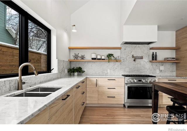 2434 Mapleton Ave, Boulder, CO 80304 - kitchen with high end range, open shelves, light brown cabinets, a sink, and vaulted ceiling