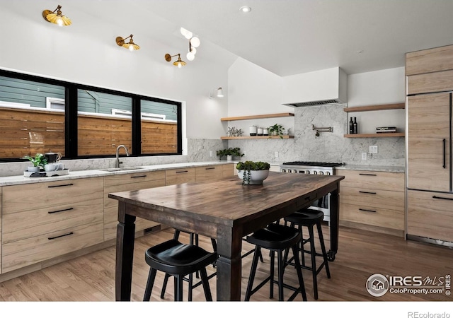 2434 Mapleton Ave, Boulder, CO 80304 - dining space with light wood-style flooring and high vaulted ceiling