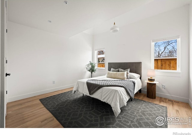2434 Mapleton Ave, Boulder, CO 80304 - bedroom featuring wood finished floors and baseboards