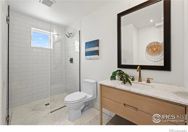 2434 Mapleton Ave, Boulder, CO 80304 - full bath with toilet, vanity, and a tile shower