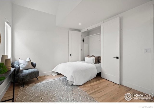 2434 Mapleton Ave, Boulder, CO 80304 - bedroom with light wood-type flooring, baseboards, and recessed lighting