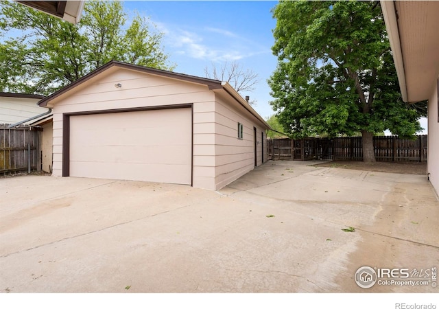 1155 Caroline Ct, Loveland, CO 80537 - detached garage featuring concrete driveway