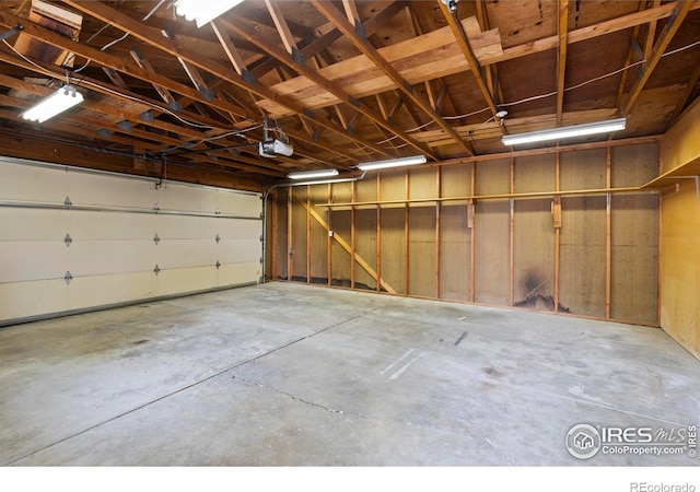 1155 Caroline Ct, Loveland, CO 80537 - garage featuring a garage door opener