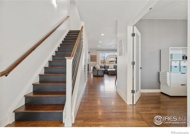 6434 Cloudburst Ave, Timnath, CO 80547 - stairway with wood finished floors and baseboards