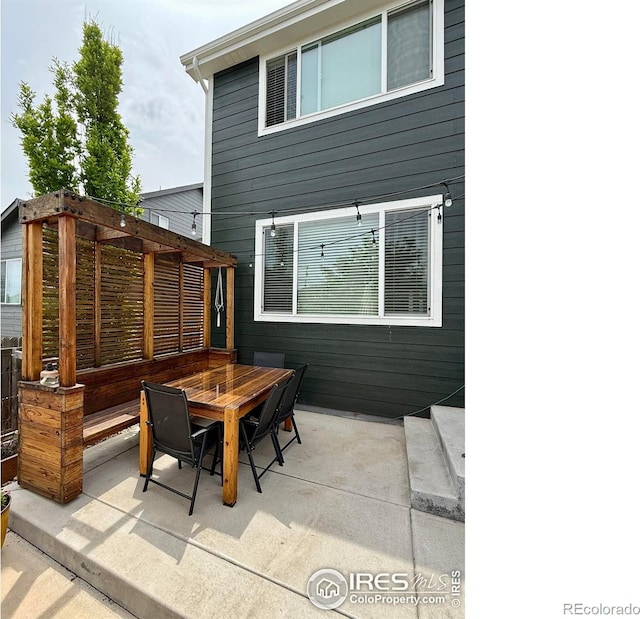 6434 Cloudburst Ave, Timnath, CO 80547 - view of patio featuring outdoor dining space