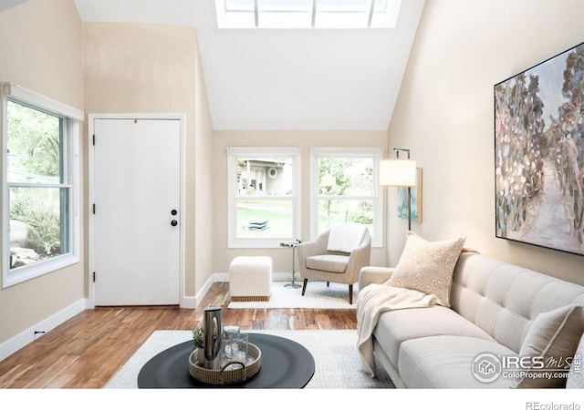 93 Benthaven Pl, Boulder, CO 80305 - living room featuring wood finished floors, baseboards, and high vaulted ceiling