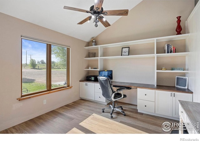 33820 County Road 47, Greeley, CO 80631 - office featuring built in study area, light wood-style flooring, ceiling fan, lofted ceiling, and baseboards