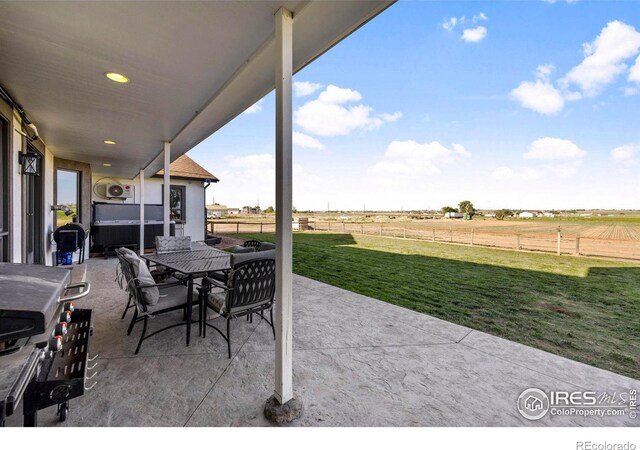 33820 County Road 47, Greeley, CO 80631 - view of patio featuring outdoor dining space and a rural view