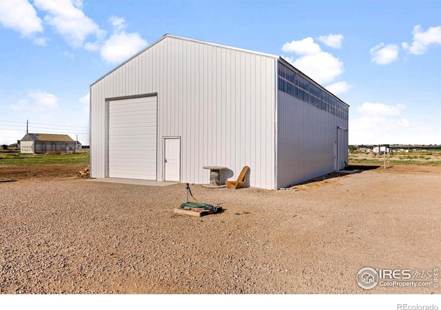 33820 County Road 47, Greeley, CO 80631 - view of outdoor structure featuring driveway