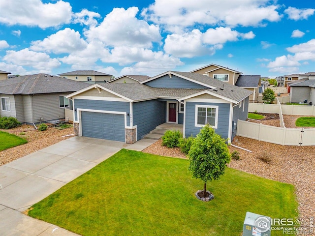 3925 Buckthorn St, Wellington, CO 80549 - view of front facade with an attached garage, concrete driveway, a residential view, and a shingled roof