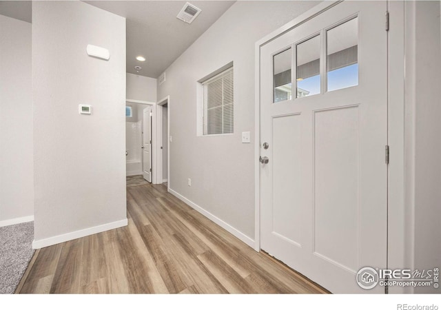 3925 Buckthorn St, Wellington, CO 80549 - foyer entrance with light wood-style floors, baseboards, and recessed lighting